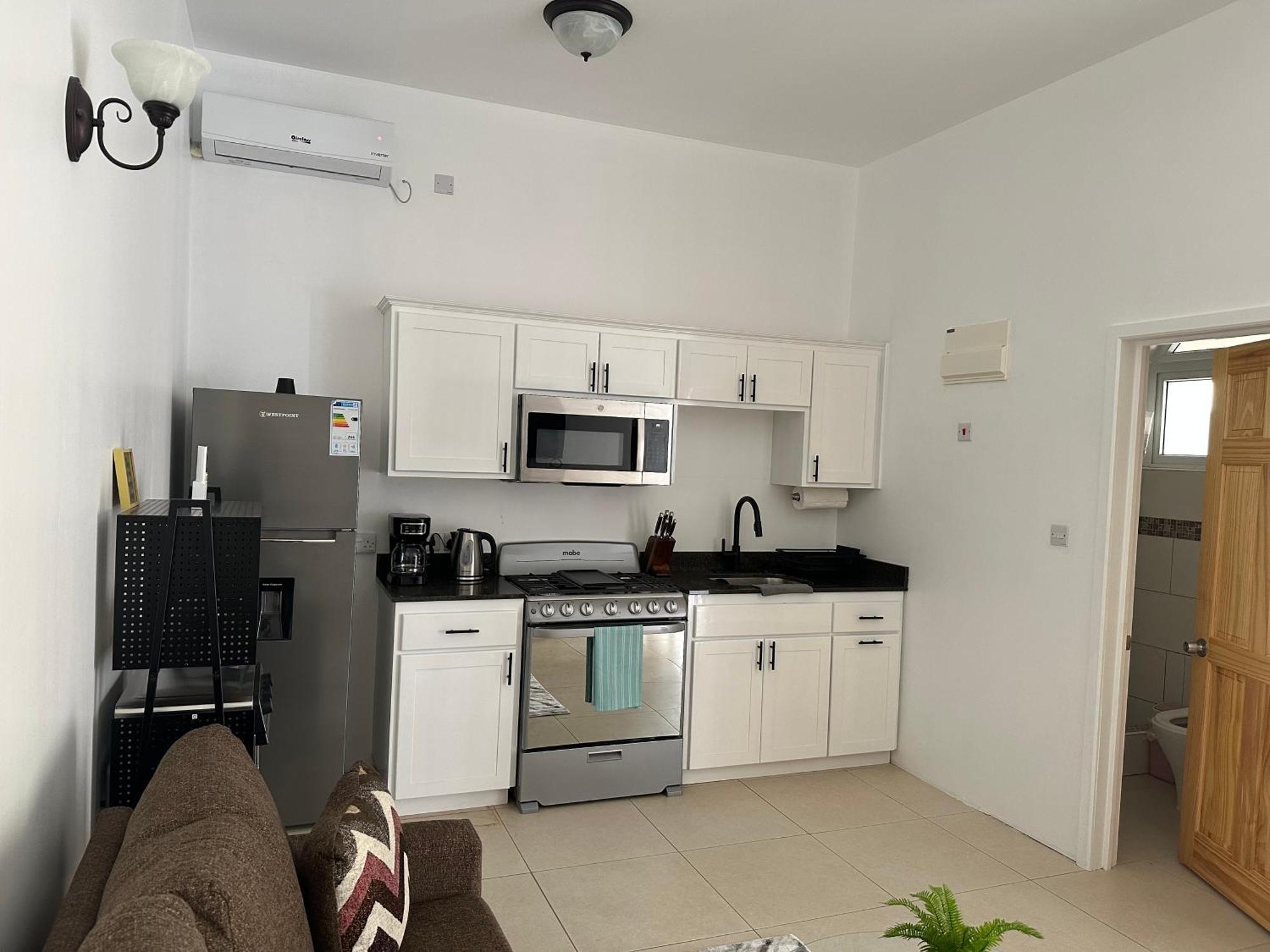 Eldorado Guesthouse & Car Rental Roseau Rom bilde