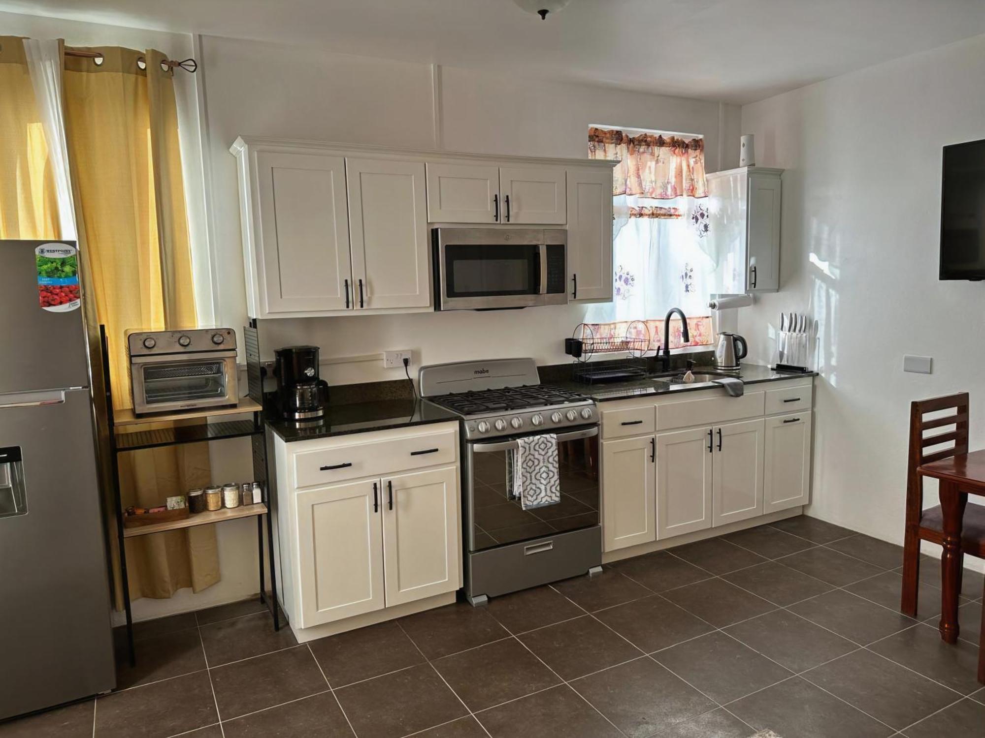 Eldorado Guesthouse & Car Rental Roseau Rom bilde